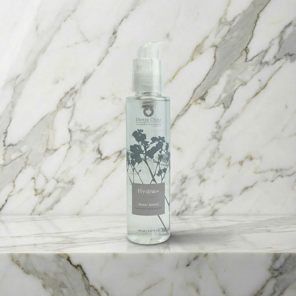 Close-up van Hydra+ glijmiddel pompje met productlabel en ingrediënten informatie