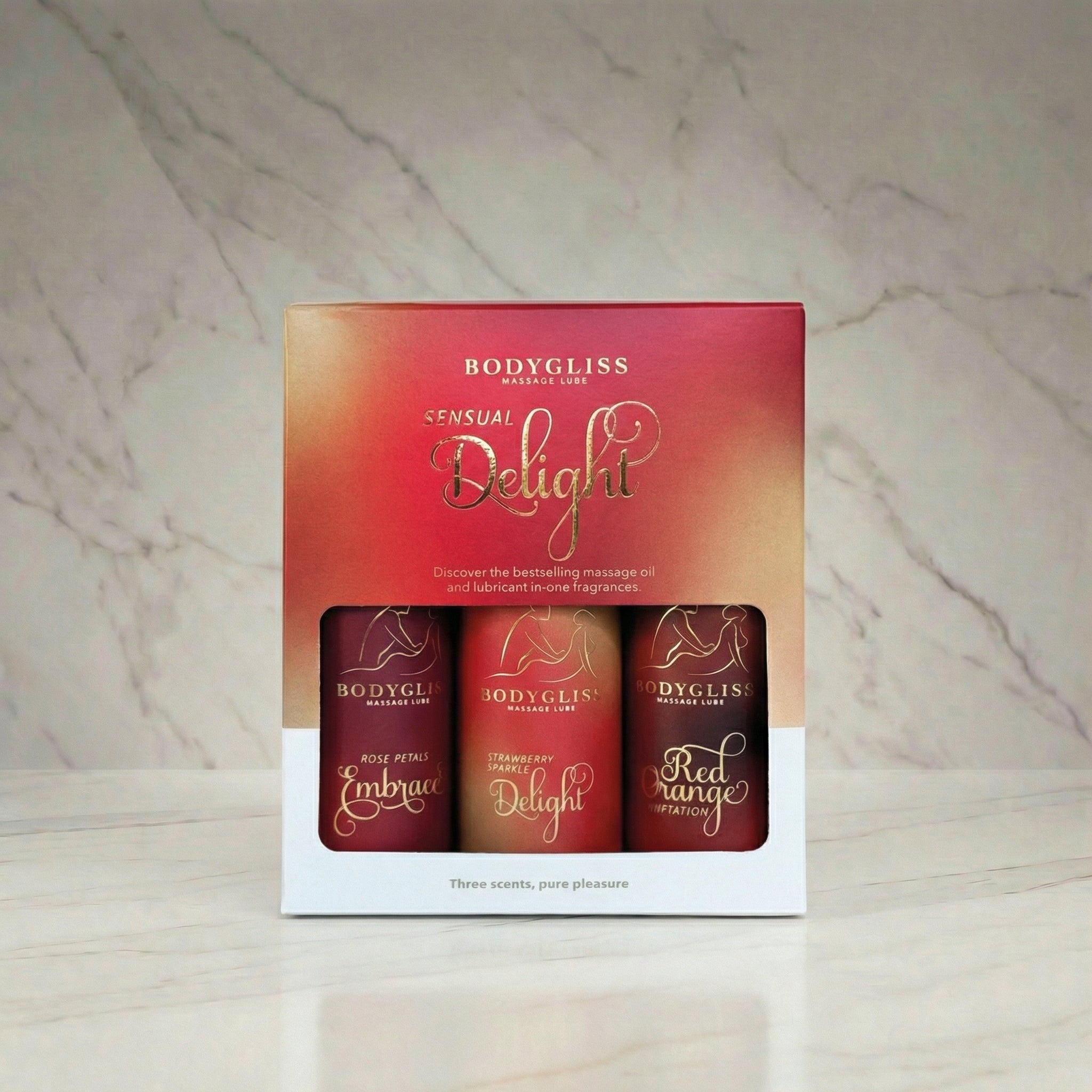 Bodygliss reissetje met drie gekleurde glijmiddelen op smaak in handige miniformat verpakking