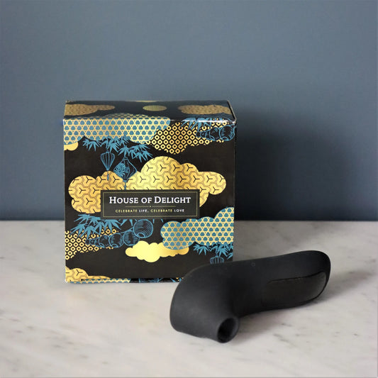 Bovenaanzicht Rock Star luchtdruk stimulator toont moderne vormgeving in roze